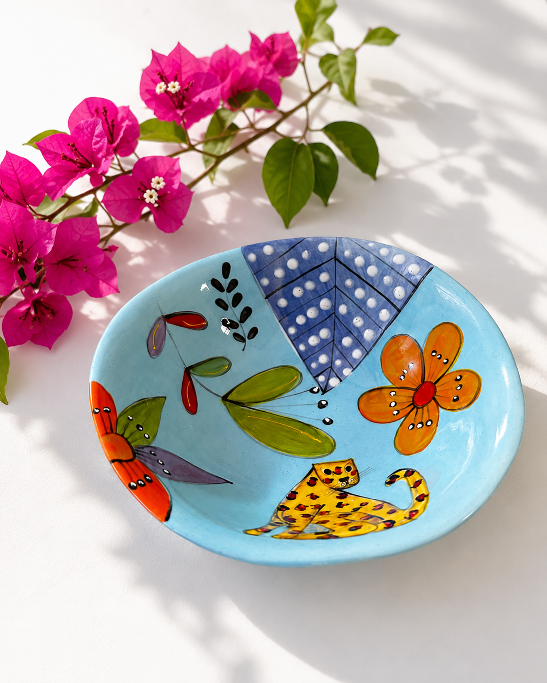 Handpainted ceramic bowl in blue cheetah design — African animal motif, everyday size | Mopti Living