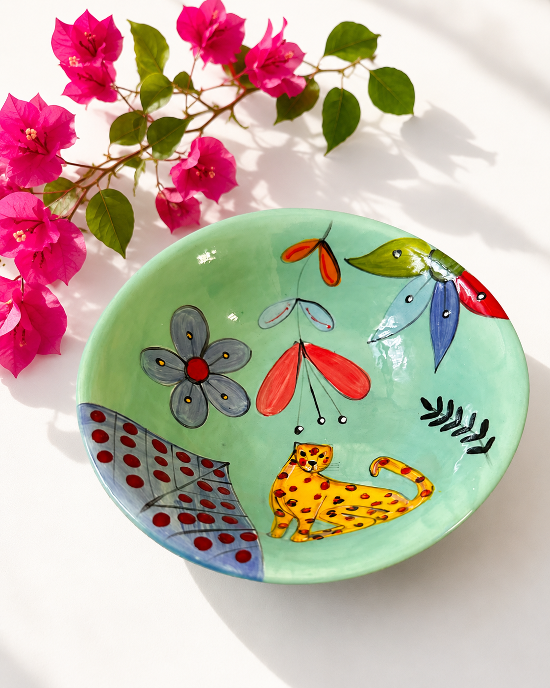 Handpainted ceramic bowl in green cheetah design — African animal motif, everyday size | Mopti Living