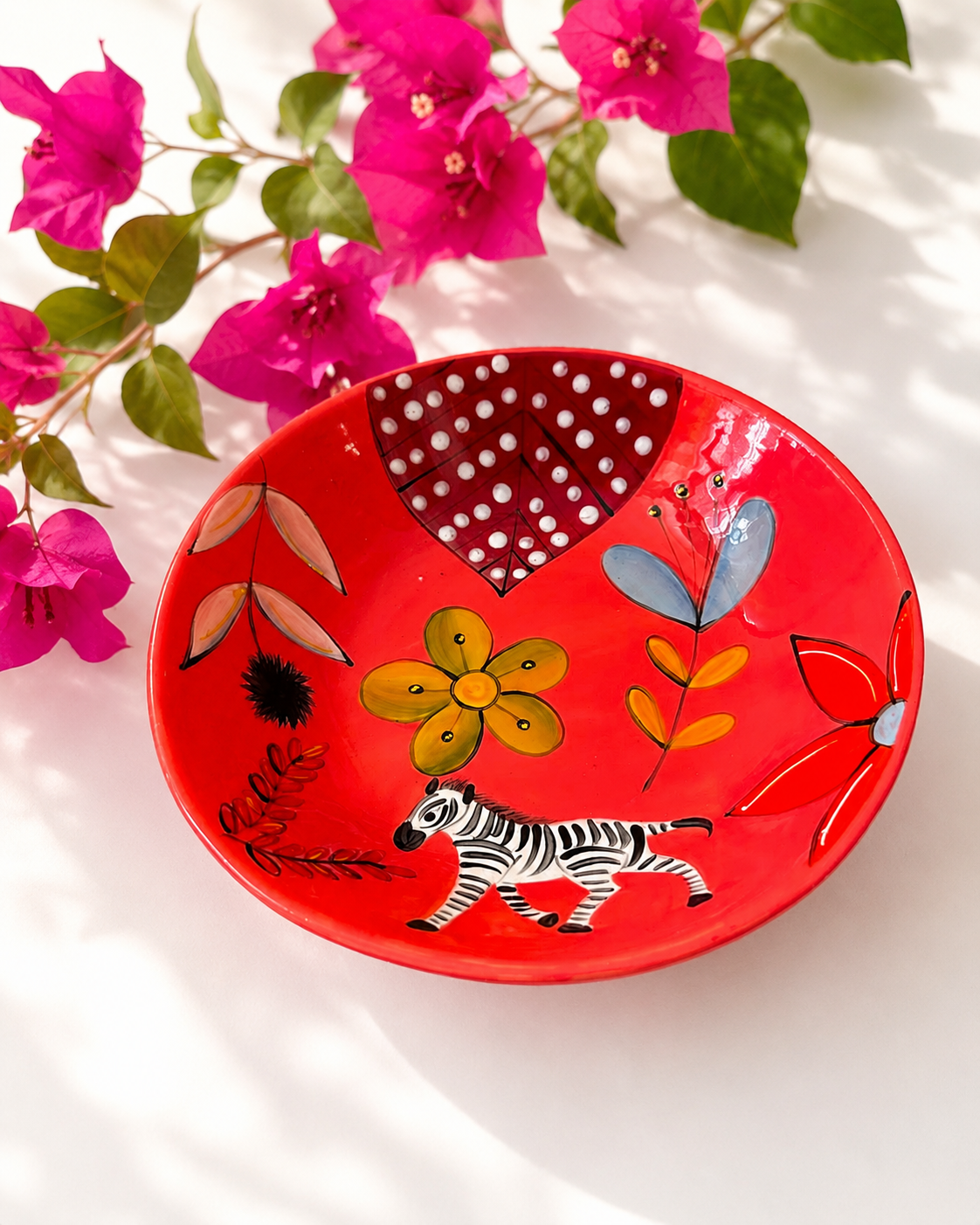 Handpainted ceramic bowl in red zebra design — African animal motif, everyday and salad size | Mopti Living
