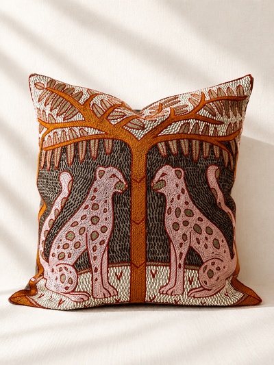 Hand-embroidered cushion cover with two white cheetahs under a tree, acrylic yarn on cotton — Mopti Living