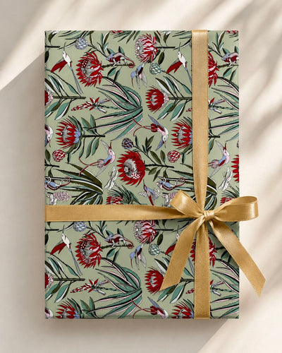 Designer wrapping paper in Avo green – bold illustrated pattern by Mopti Living
