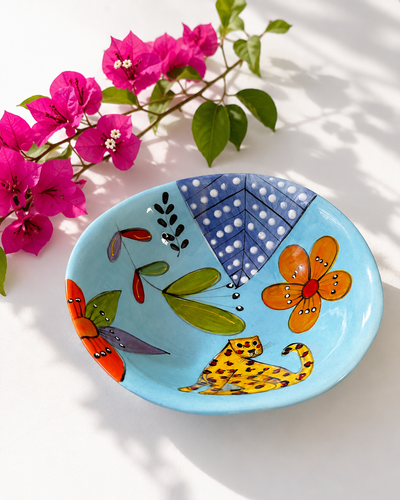 Handpainted ceramic bowl in blue cheetah design — African animal motif, everyday size | Mopti Living
