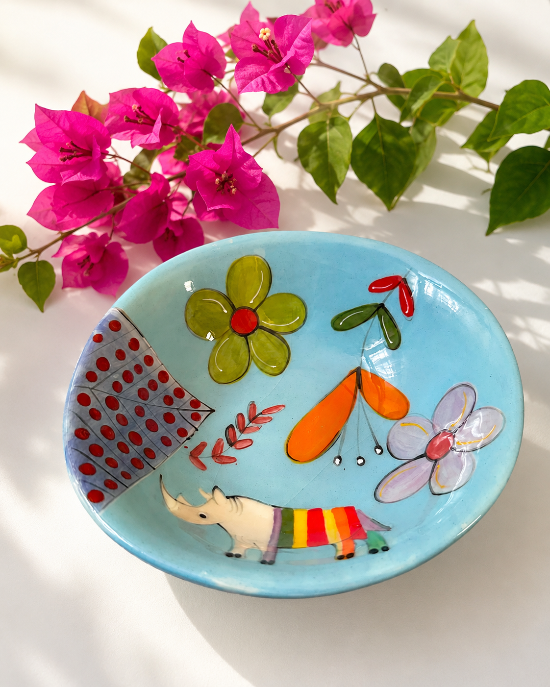Handpainted ceramic bowl in blue rhino design — African animal motif, everyday size | Mopti Living