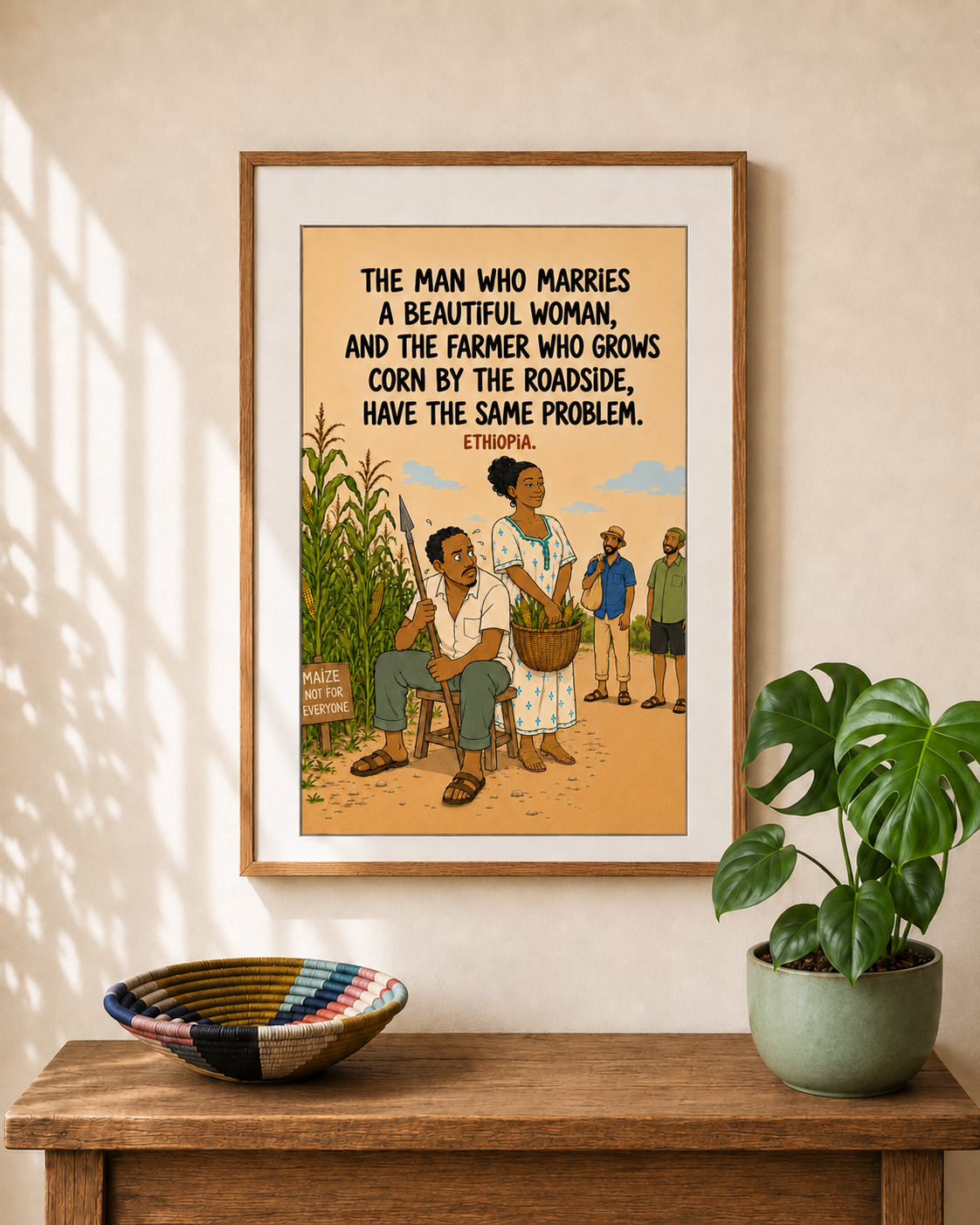 Framed illustrated art print from Ethiopia — a farmer and his wife by a roadside cornfield, with onlookers passing. Proverb: The man who marries a beautiful woman, and the farmer who grows corn by the roadside, have the same problem. From Mopti's African Proverbs Series.