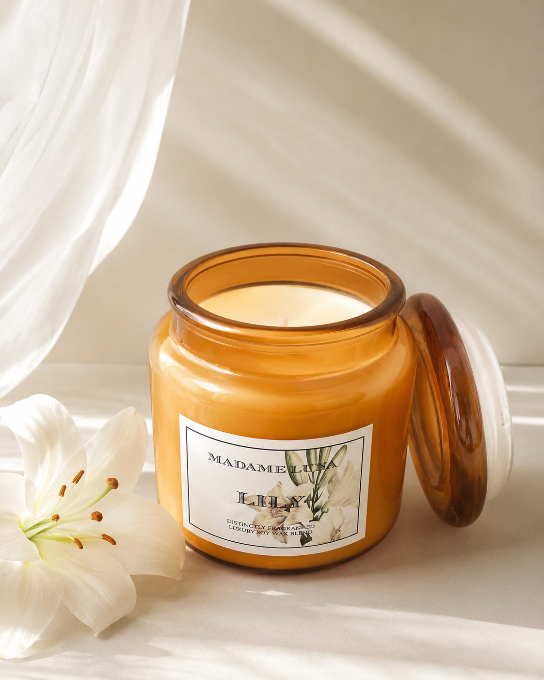 Mopti Living lily soy candle in an amber glass jar