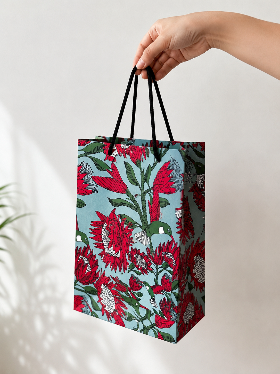 Designer gift bag – Protea on blue illustrated pattern with rope handles by Mopti Living