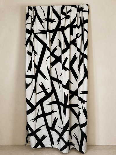 Authentic bogolan, white brushstroke design, natural-dyed African textile