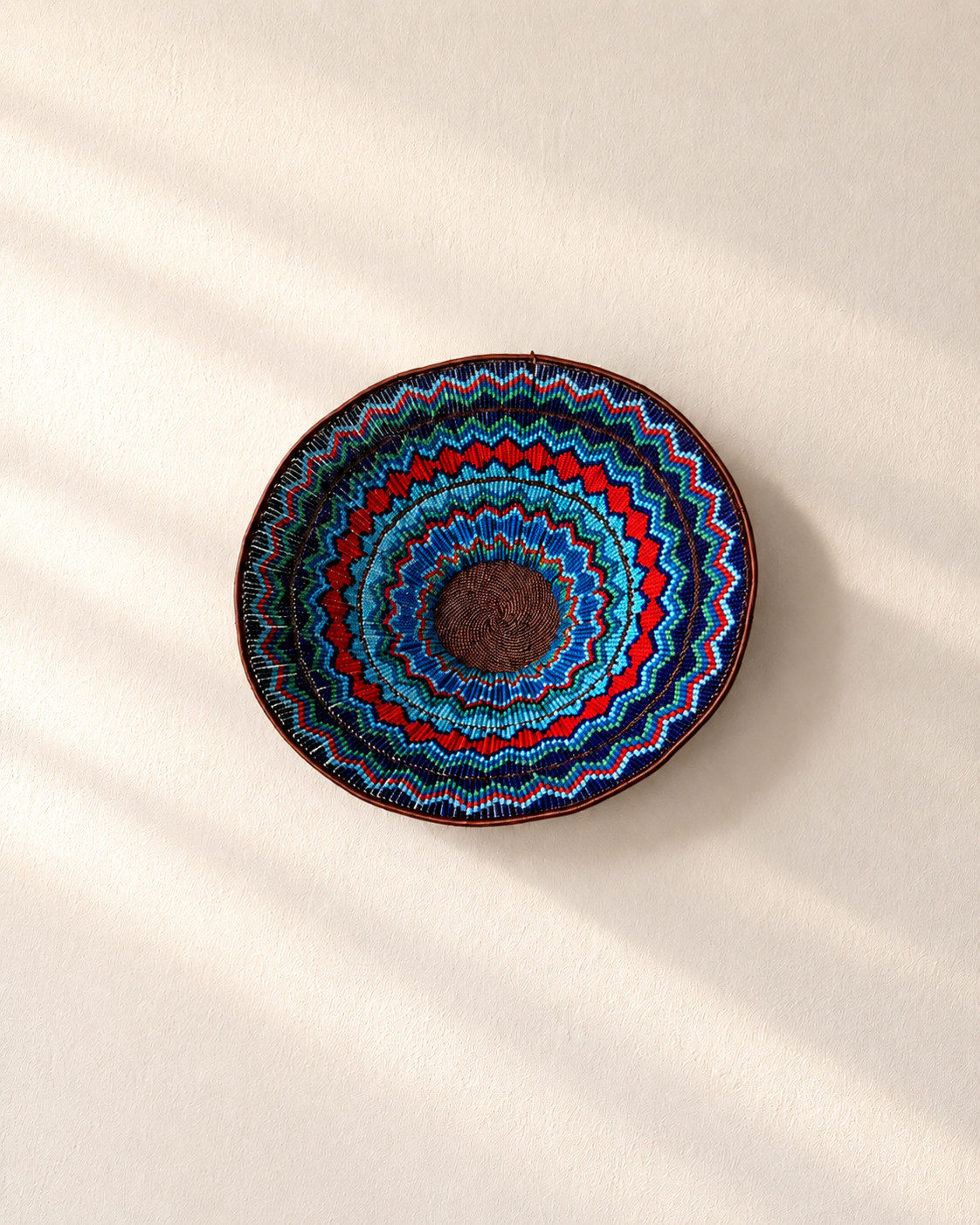 Hand-beaded bowl on copper wire frame with concentric zigzag bead pattern — Mopti Living