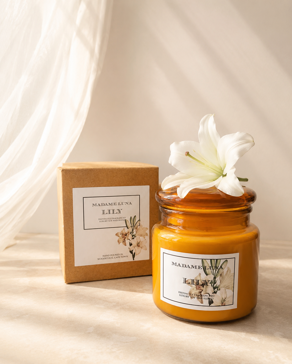 Mopti Living lily scented candle with amber jar and kraft gift box
