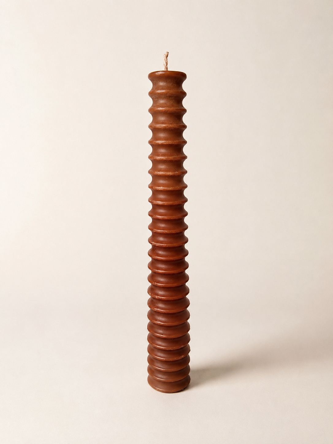 Oryx sculptural pillar candle in Terracotta – tall ribbed form, hand-poured and unscented | Mopti Living
