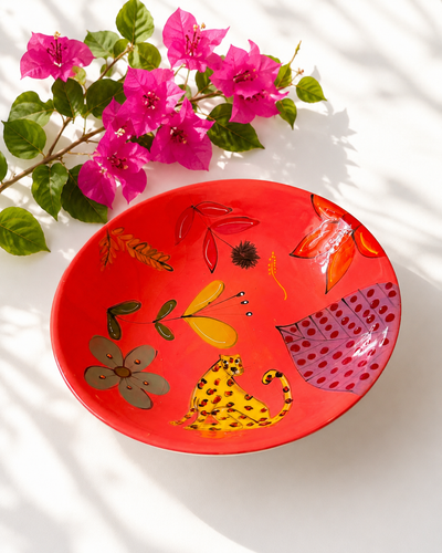 Handpainted ceramic bowl in red cheetah design — African animal motif, everyday and salad size | Mopti Living