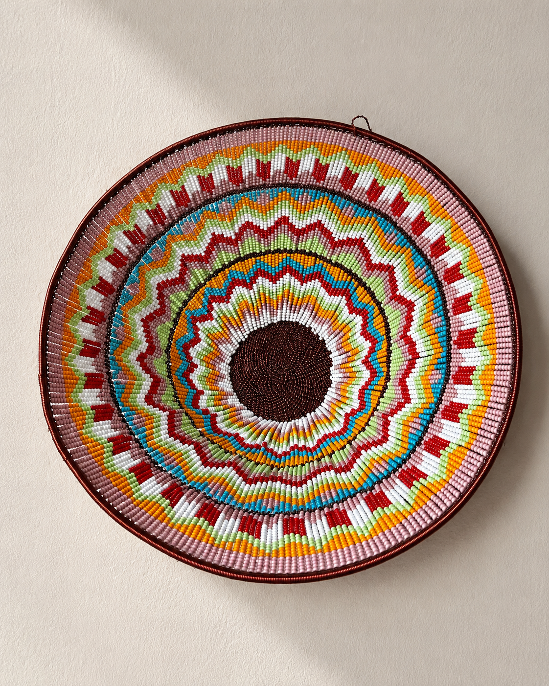 Hand-beaded bowl on copper wire frame with concentric zigzag bead pattern — Mopti Living