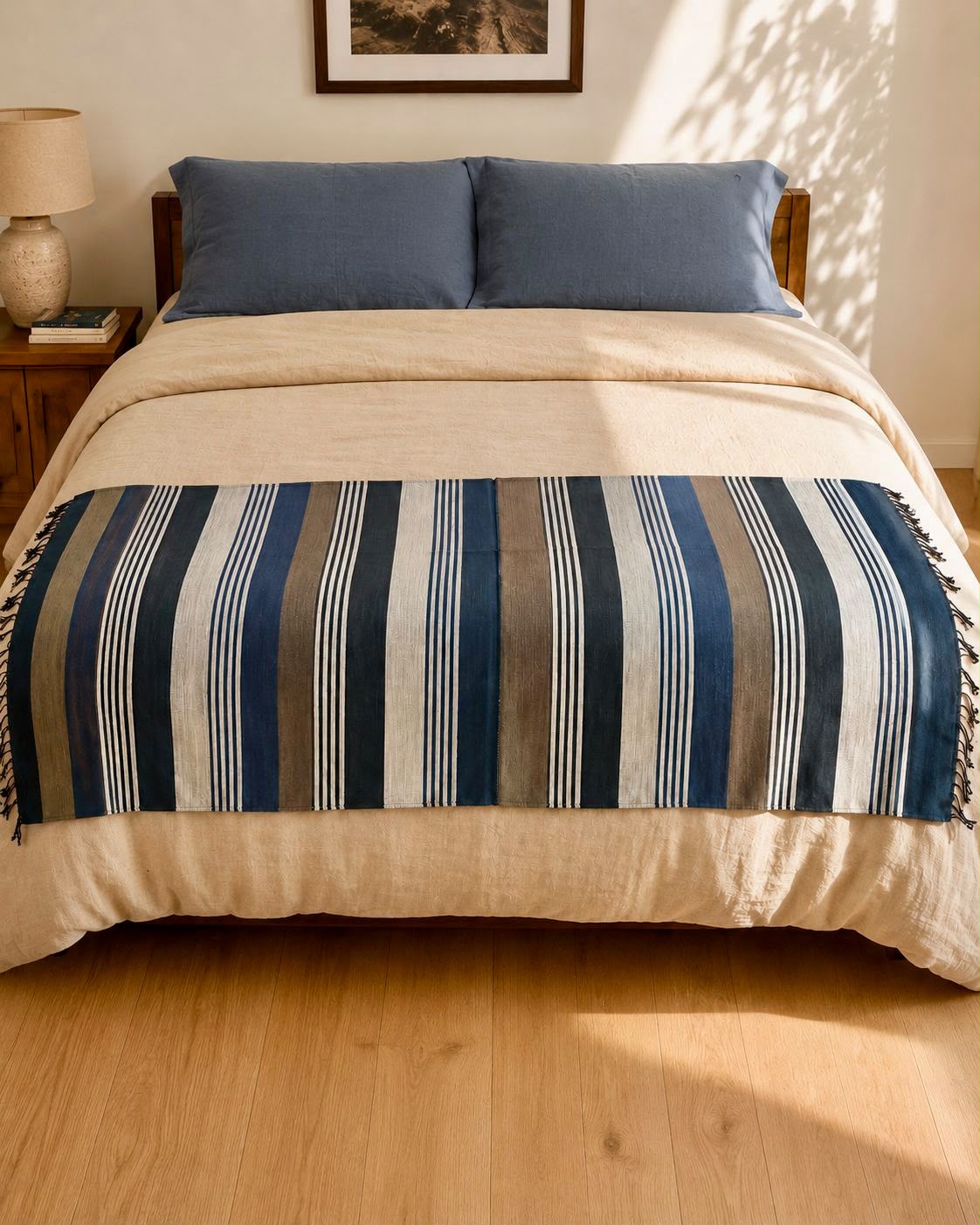 Sitota handwoven Ethiopian cotton throw draped at the foot of a bed – Mopti Living