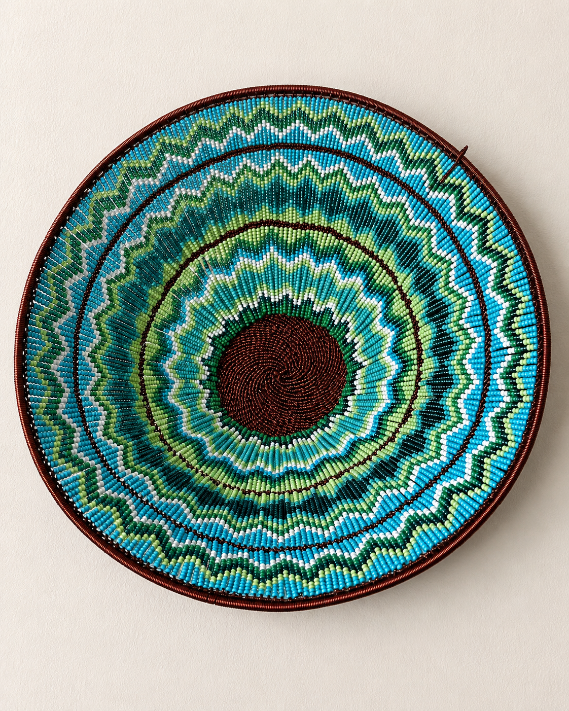 Hand-beaded bowl on copper wire frame with concentric zigzag bead pattern — Mopti Living