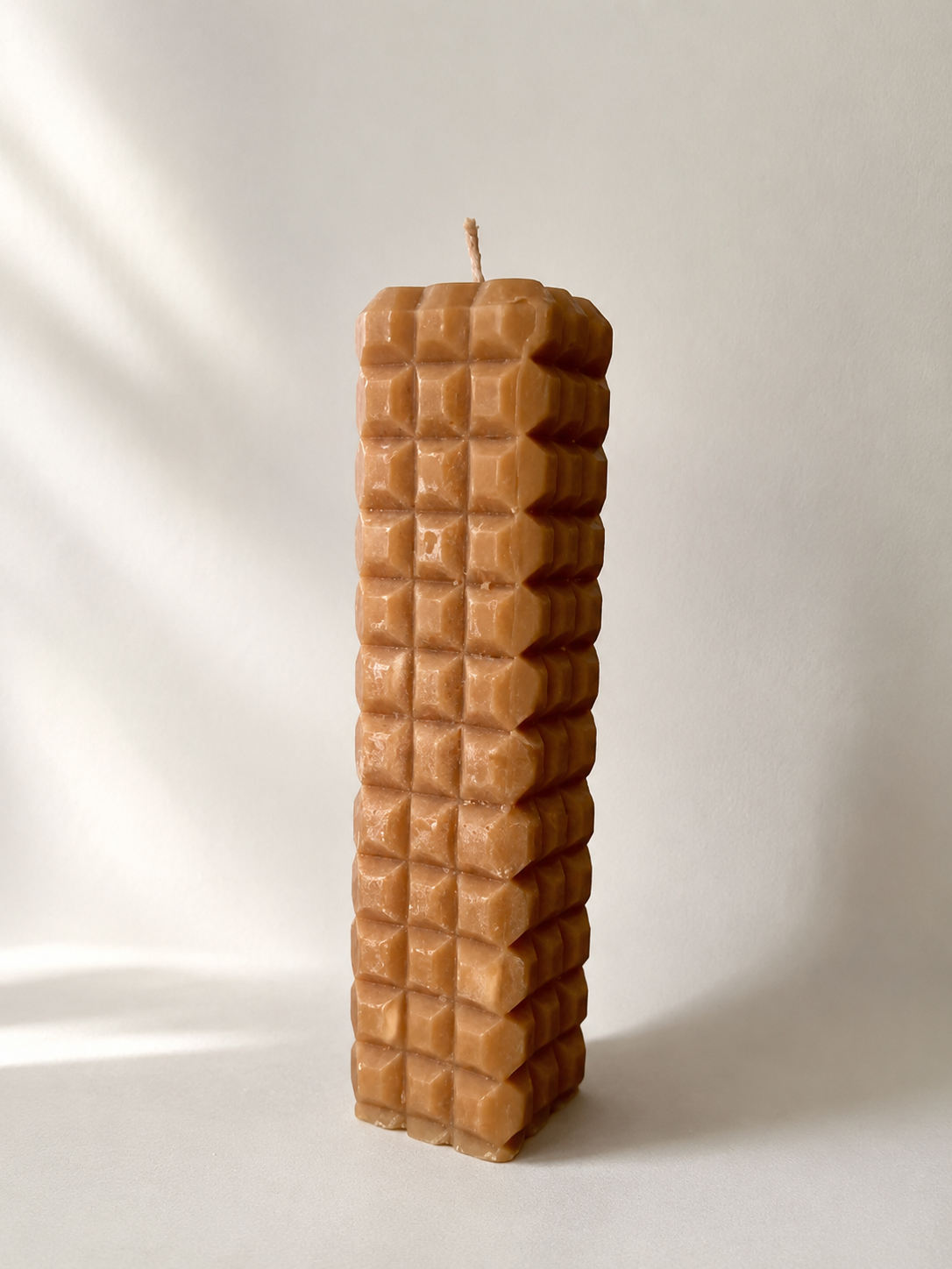 Wabi sculptural pillar candle in Coral – raised geometric texture, handmade finish | Mopti Living
